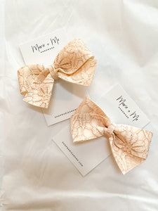 charlotte bow ♡ embossed rose vegan leather